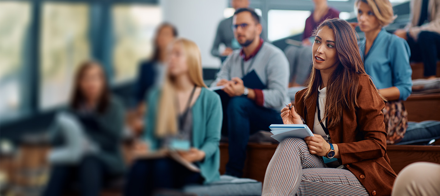 Woman sitting in a lecture
