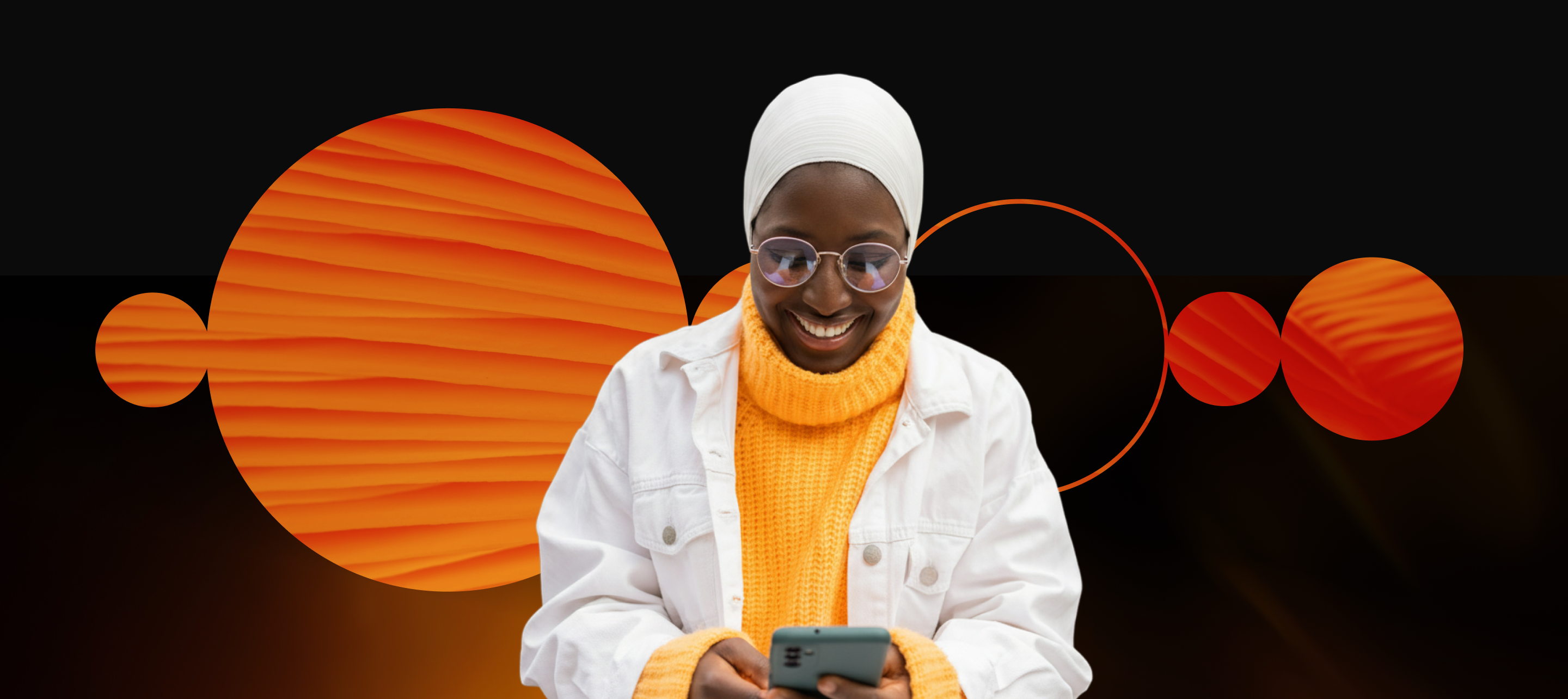 Woman looking at her phone in front of Mastercard circles