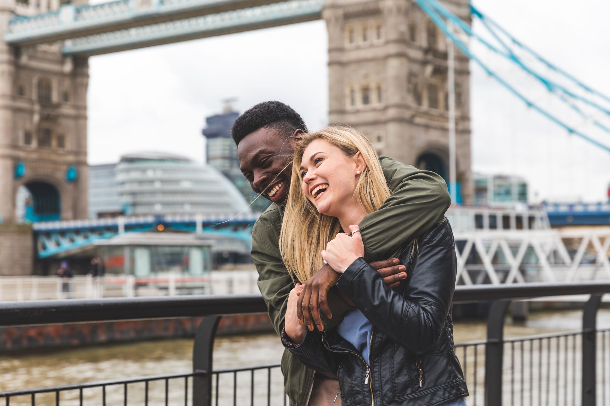 Couple laughing and hugging