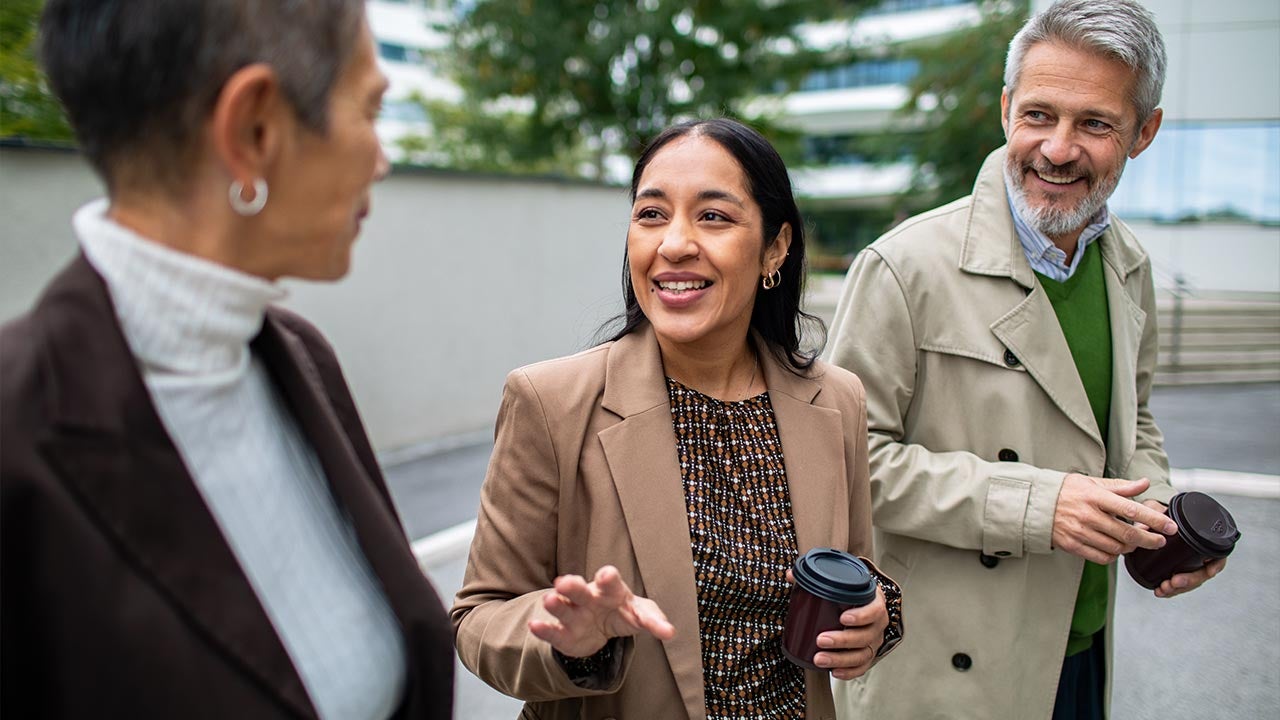 Group of workers walking into work