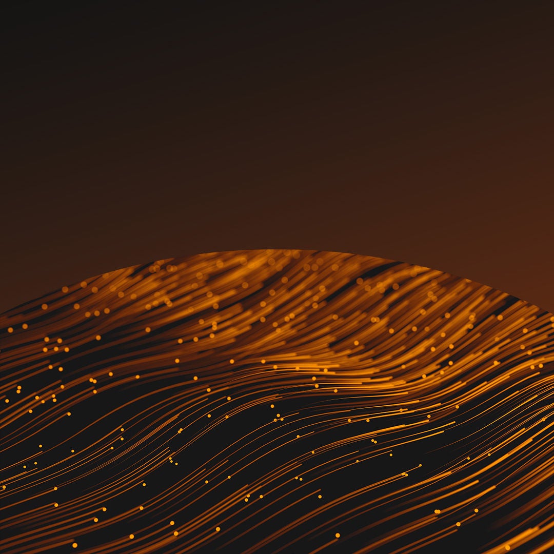 Streaks of orange yellow light flowing.