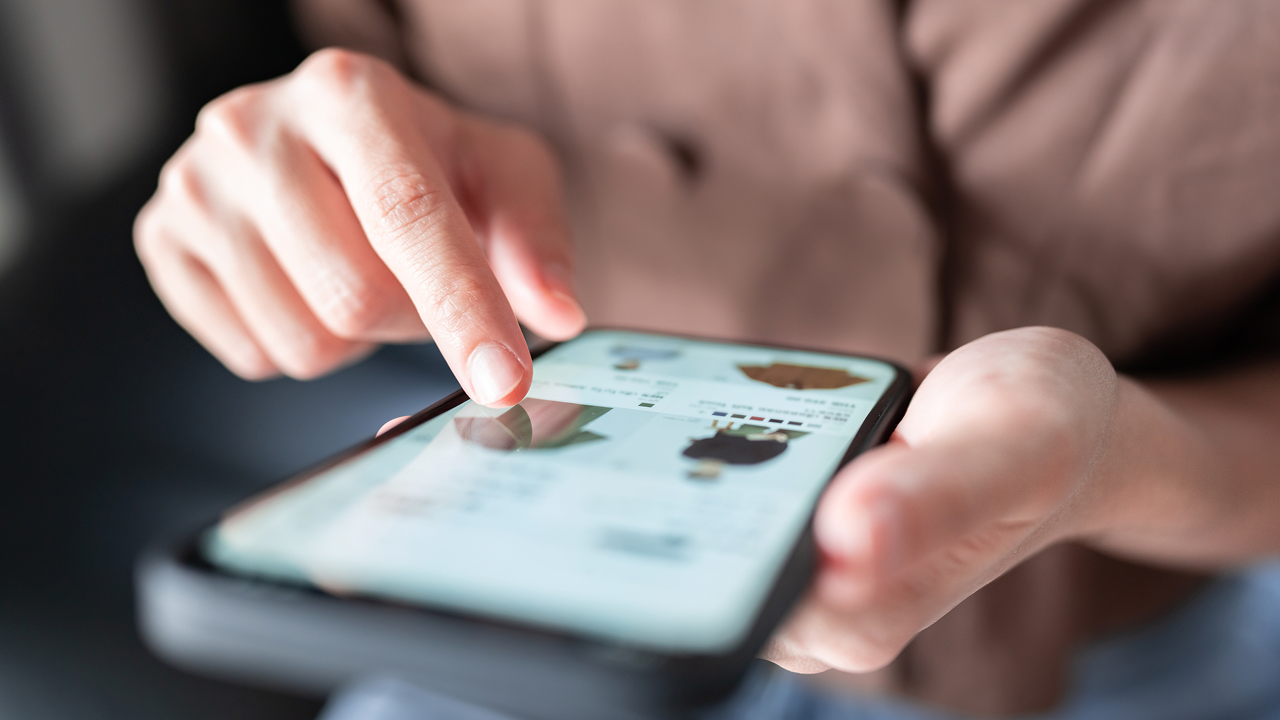 Finger tapping icon on phone