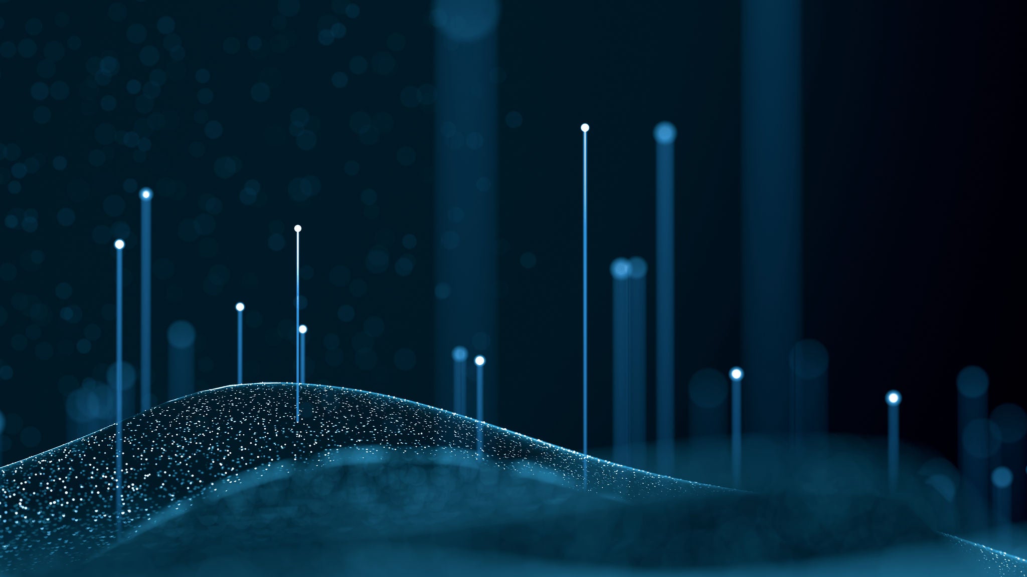 Young Woman Looks Over Cloudscape From Mountain Top