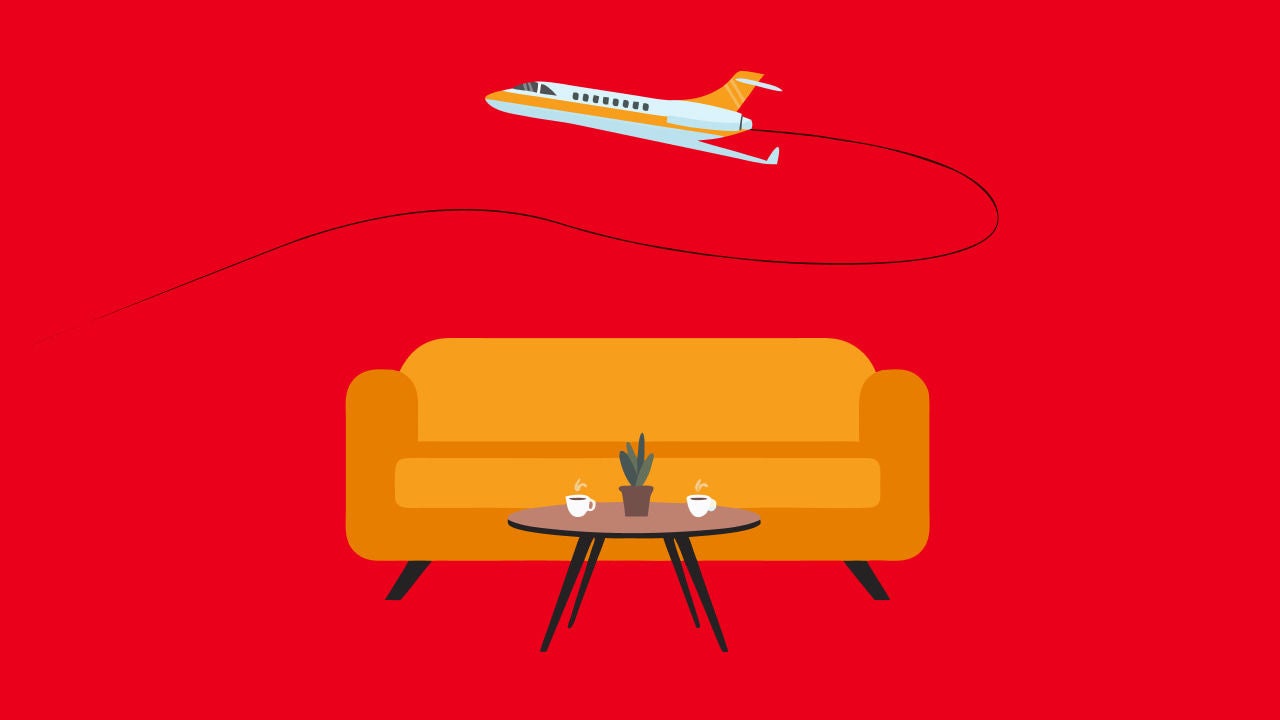 airplane flying over orange sofa