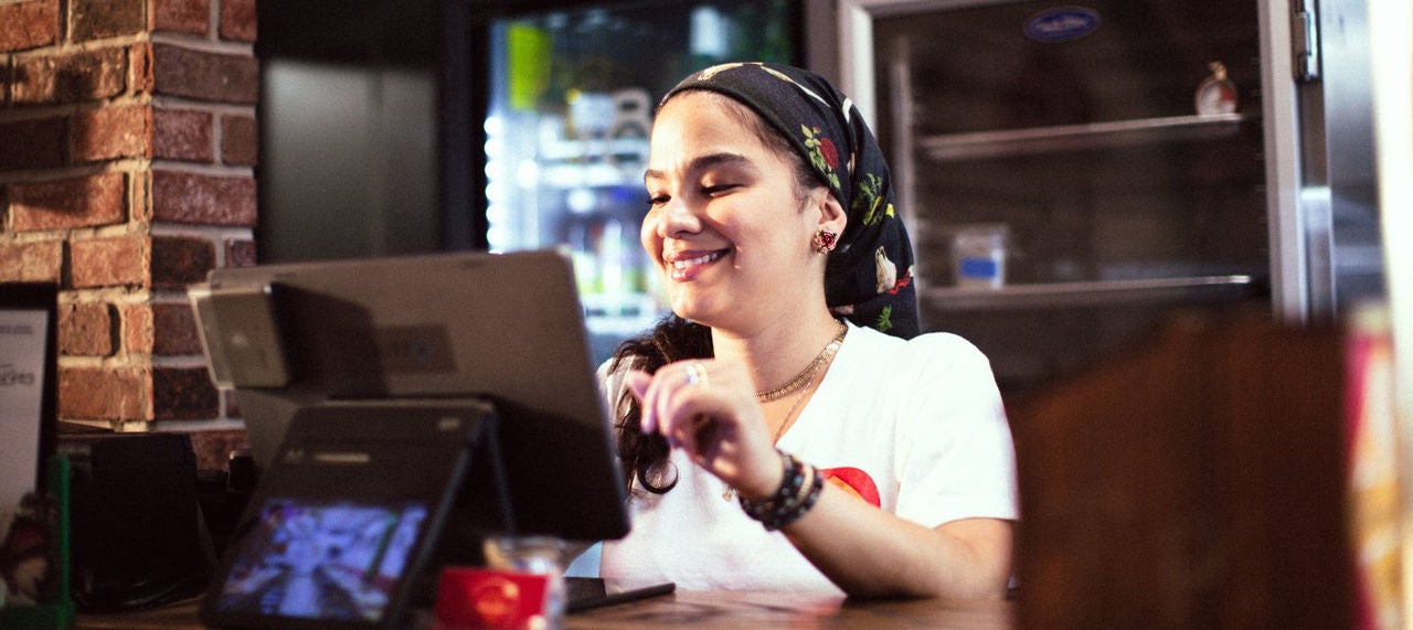 A woman at a register