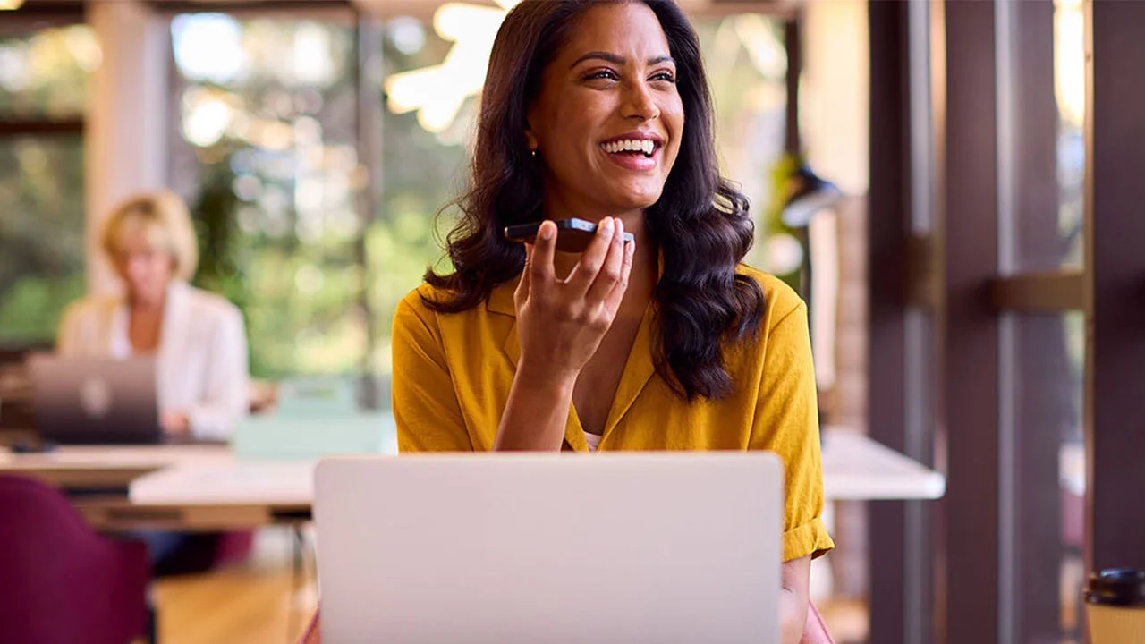 Image depicting the process of using a credit card on a mobile device for transactions.