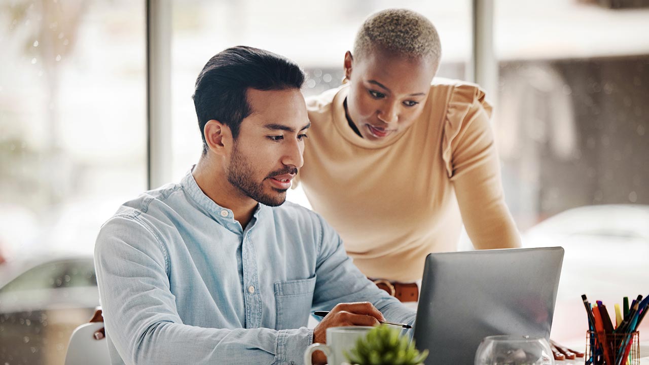 Woman working on laptop at home