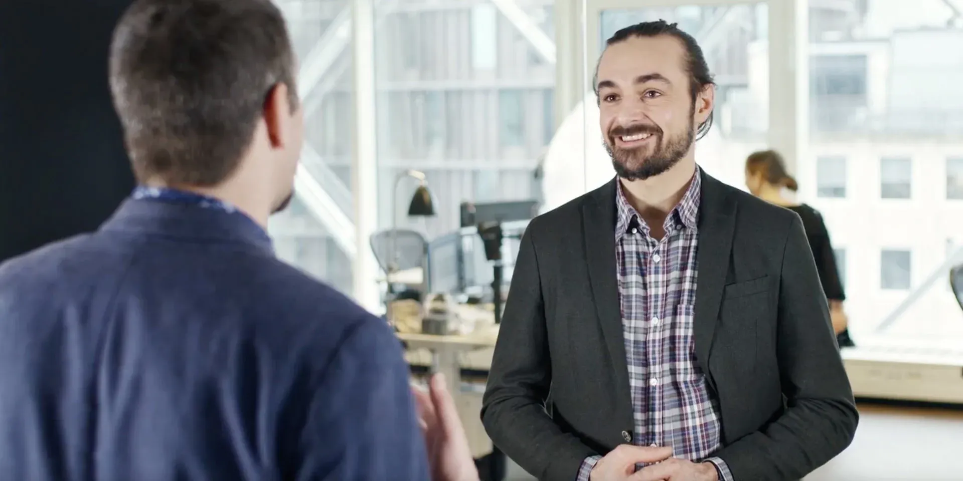 Two men talking in the office