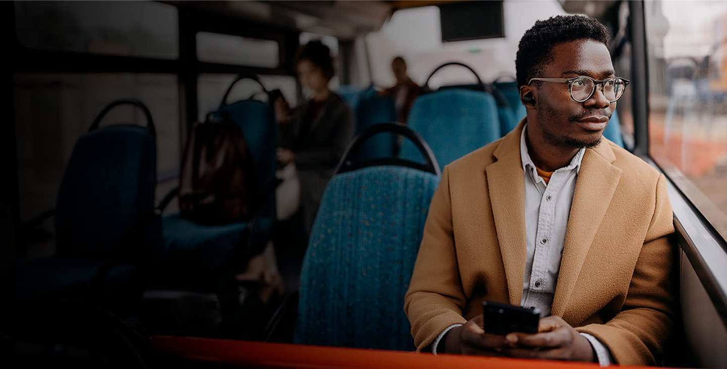 Man sitting on public transportation