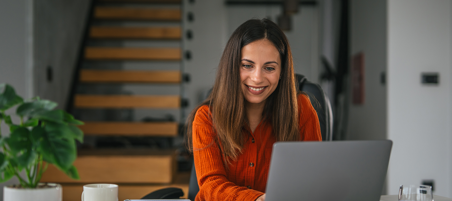 Woman browsing her laptop