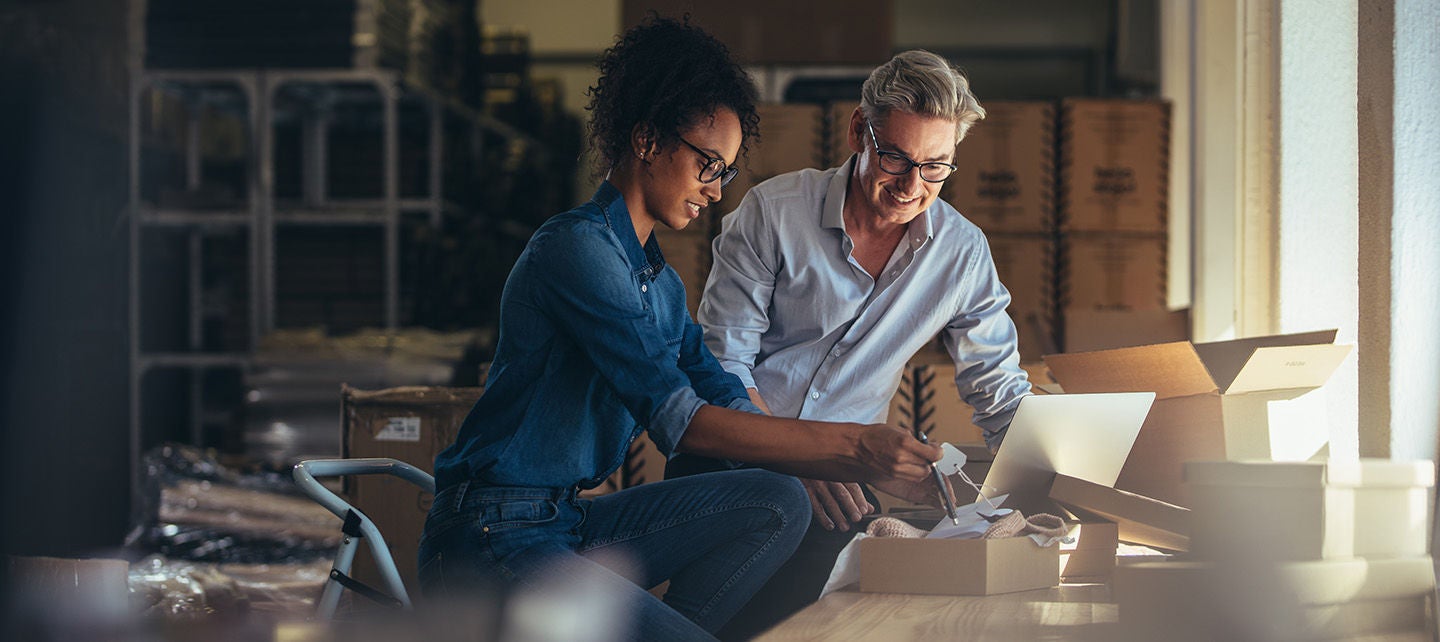 man and woman in a workshop
