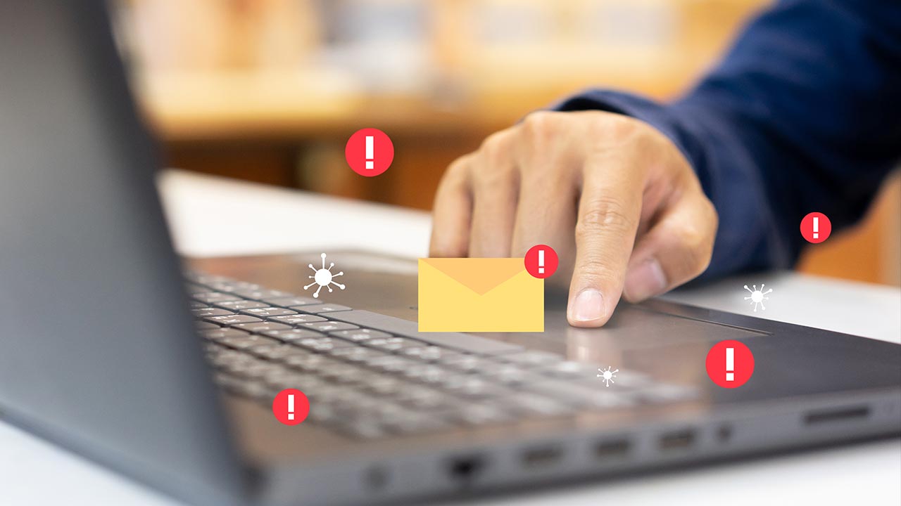 Computer engineer writing a code to protect and block spam email.