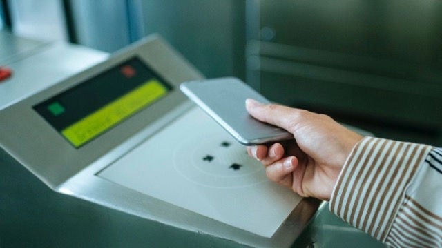 Person using phone to make payment