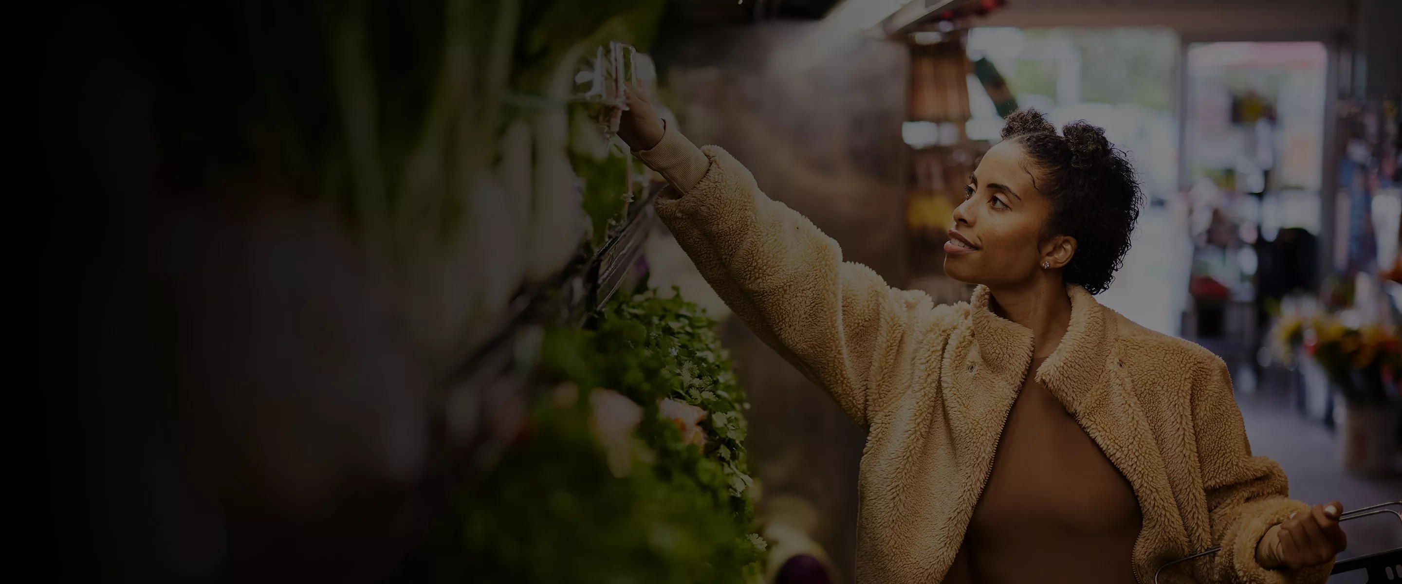 Man looking at products in a convenience store