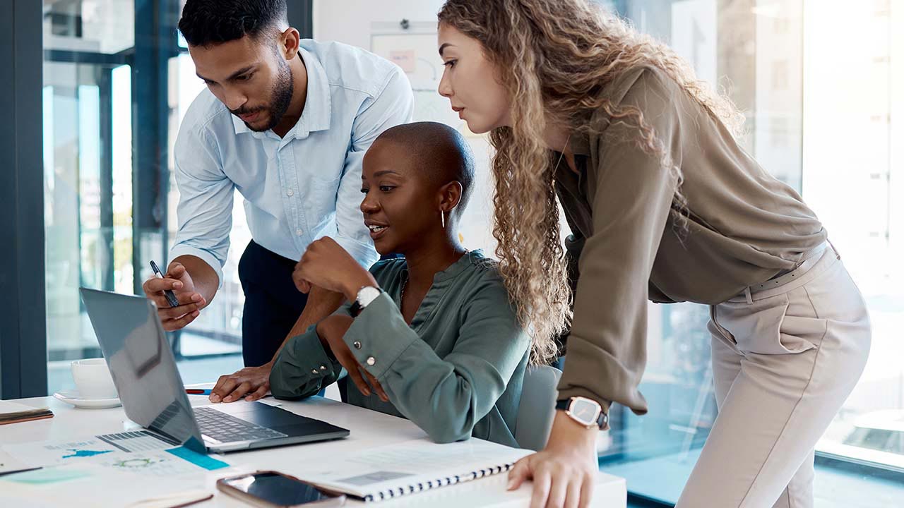Business people in working in a group.