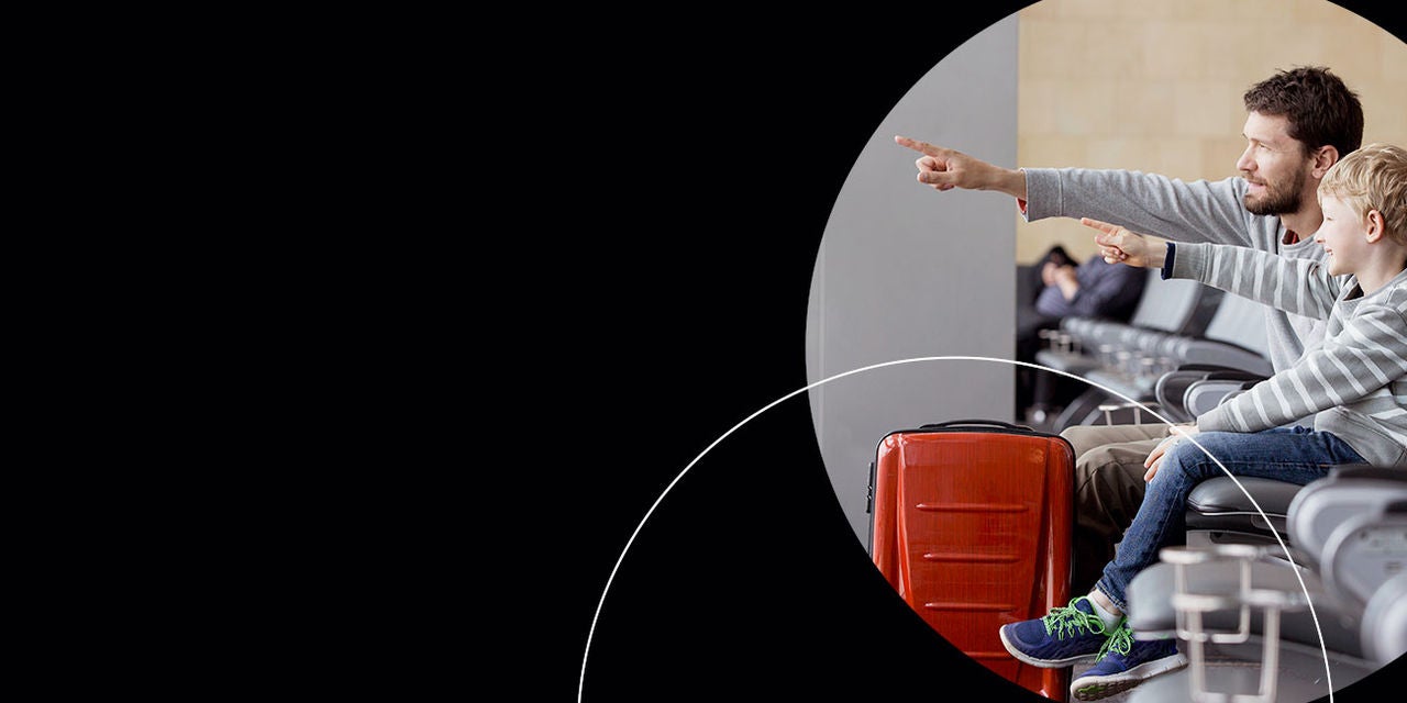 man with kid in the airport