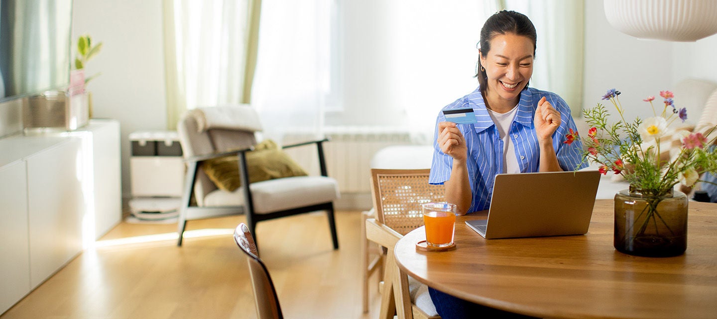 Woman shopping online on her laptop