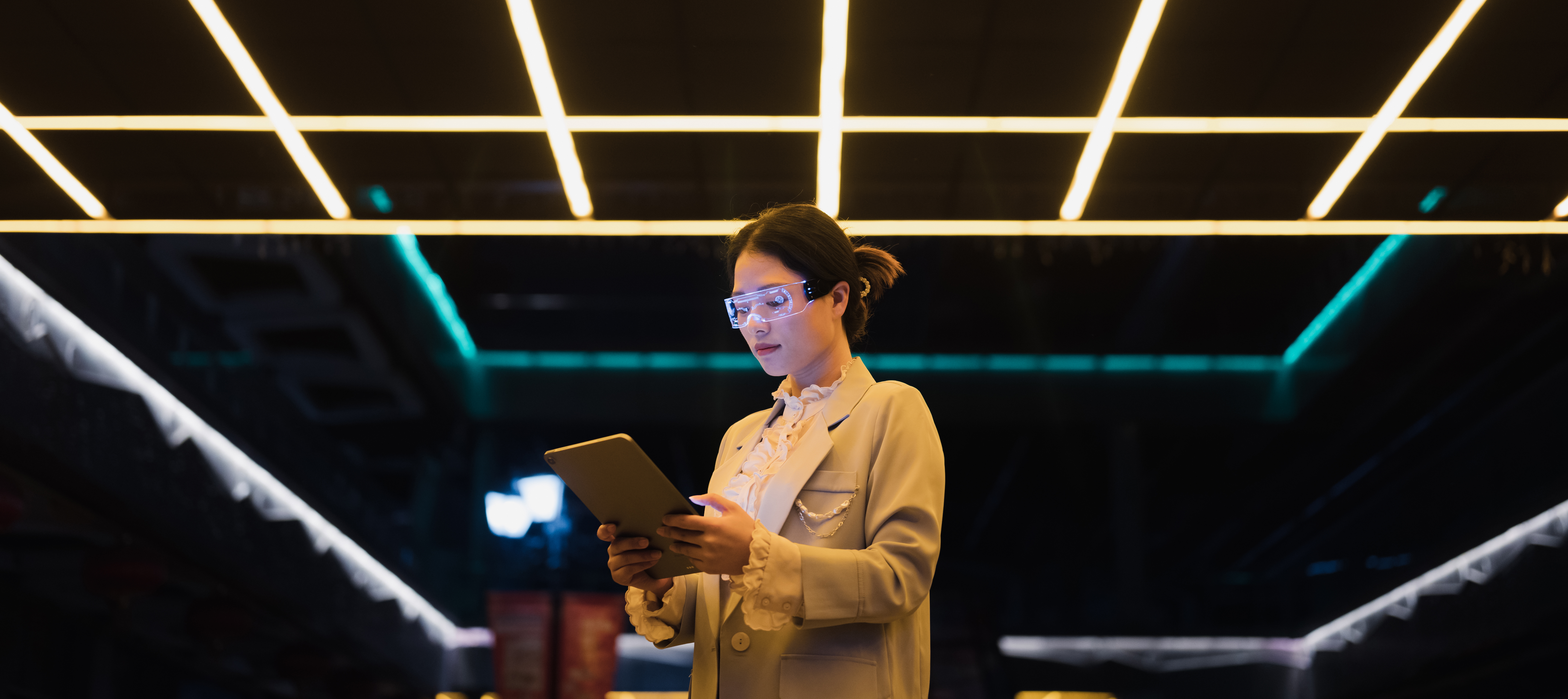 Woman using future tech in a lab