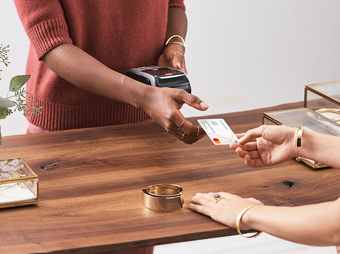 Someone paying using debit card