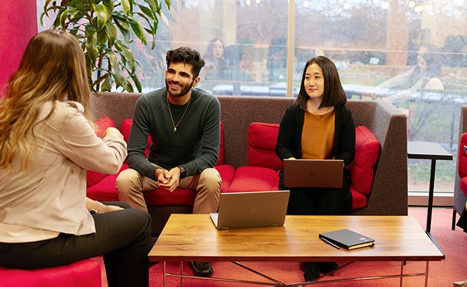 Group of employees collaborating during a meeting.