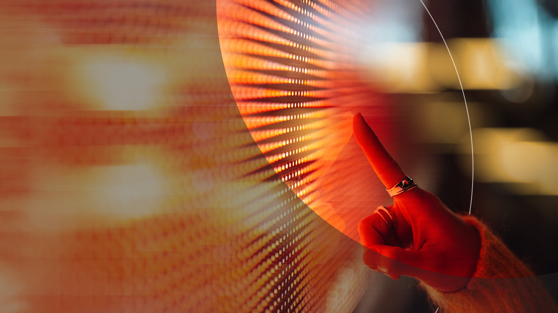 Close up of woman hand touching bright screen.