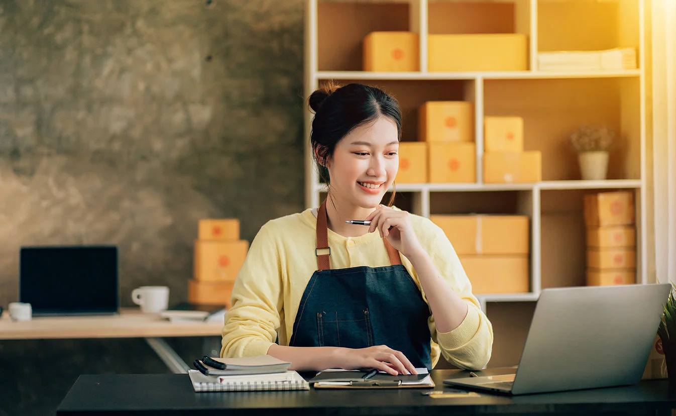 A close-up image of a chain illuminated by orange lights.