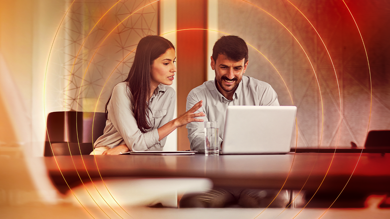 Two people in the office brainstorming