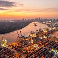young asian businesswoman using phone at office.