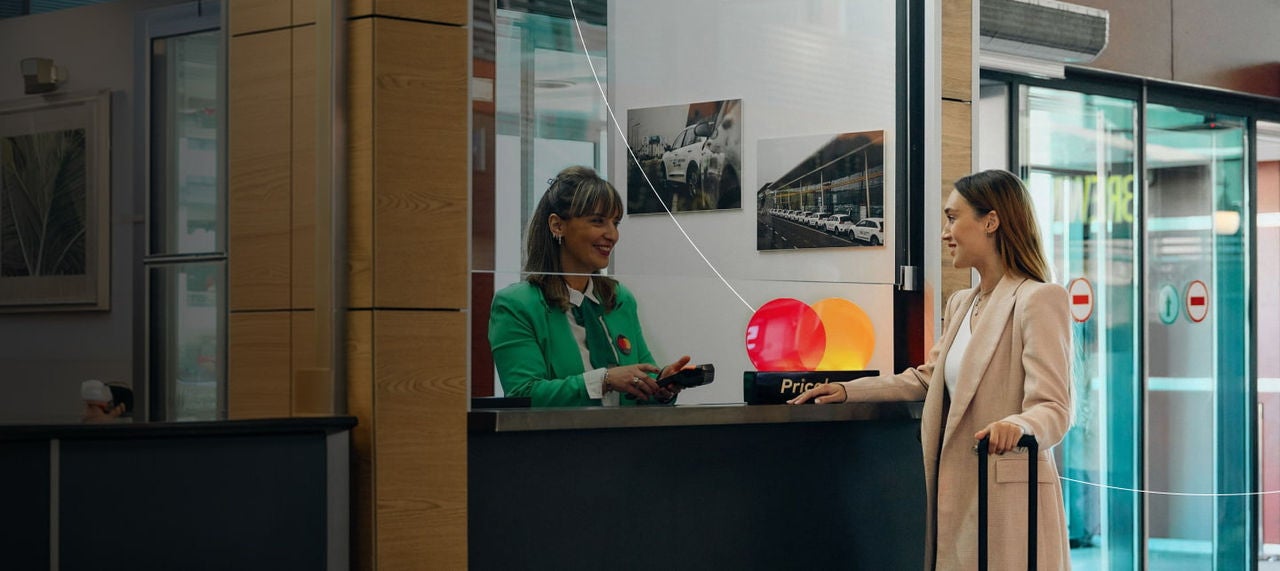 two women at reception counter