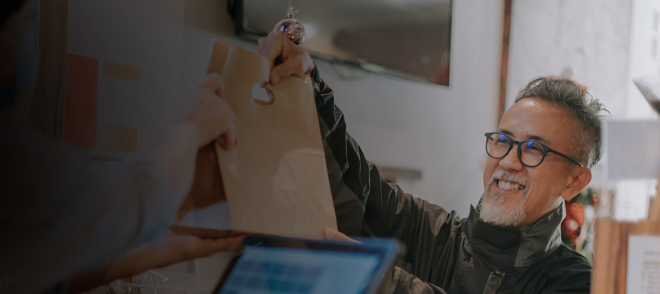 Man getting his order at a restaurant
