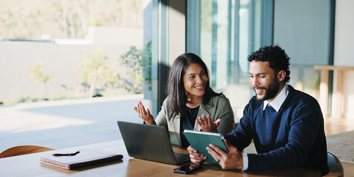 A man and a woman in a learning session