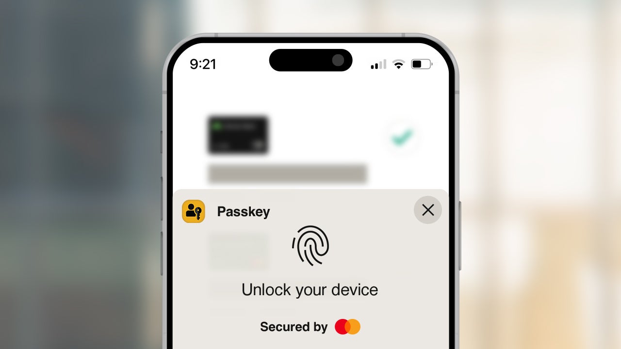 Passkey "Unlock your device" screen on a phone.