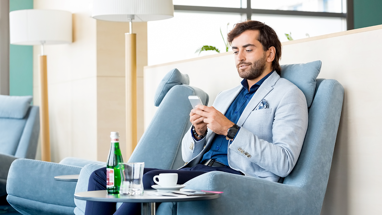man waiting for flight