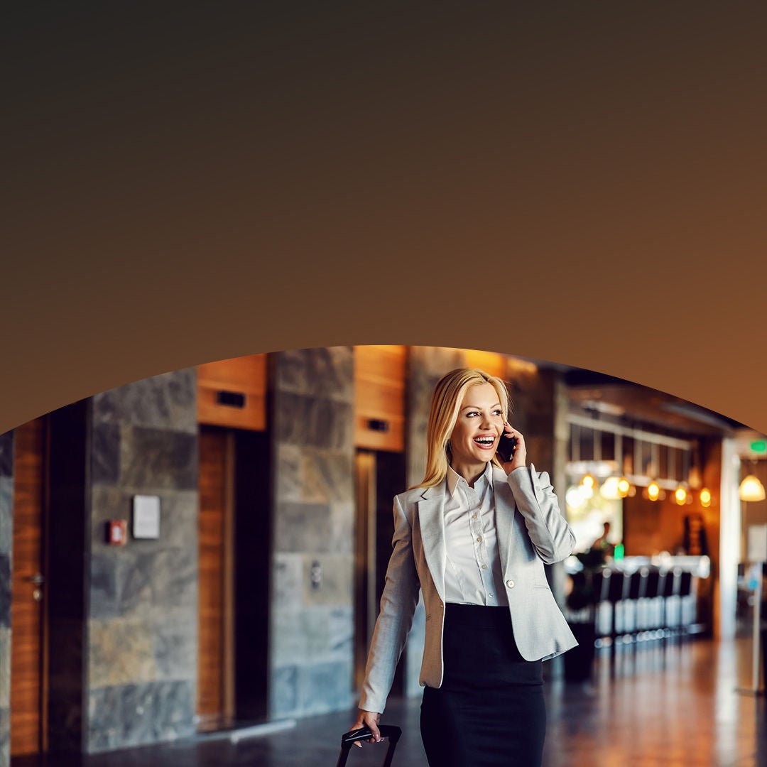 Happy businesswoman on business travel.