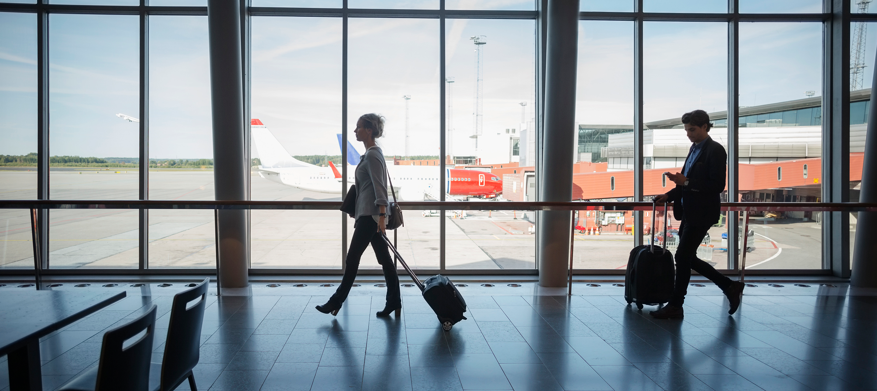 People walking in an airport terminal