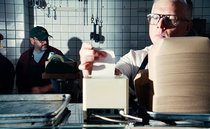 Chef managing orders at restaurant