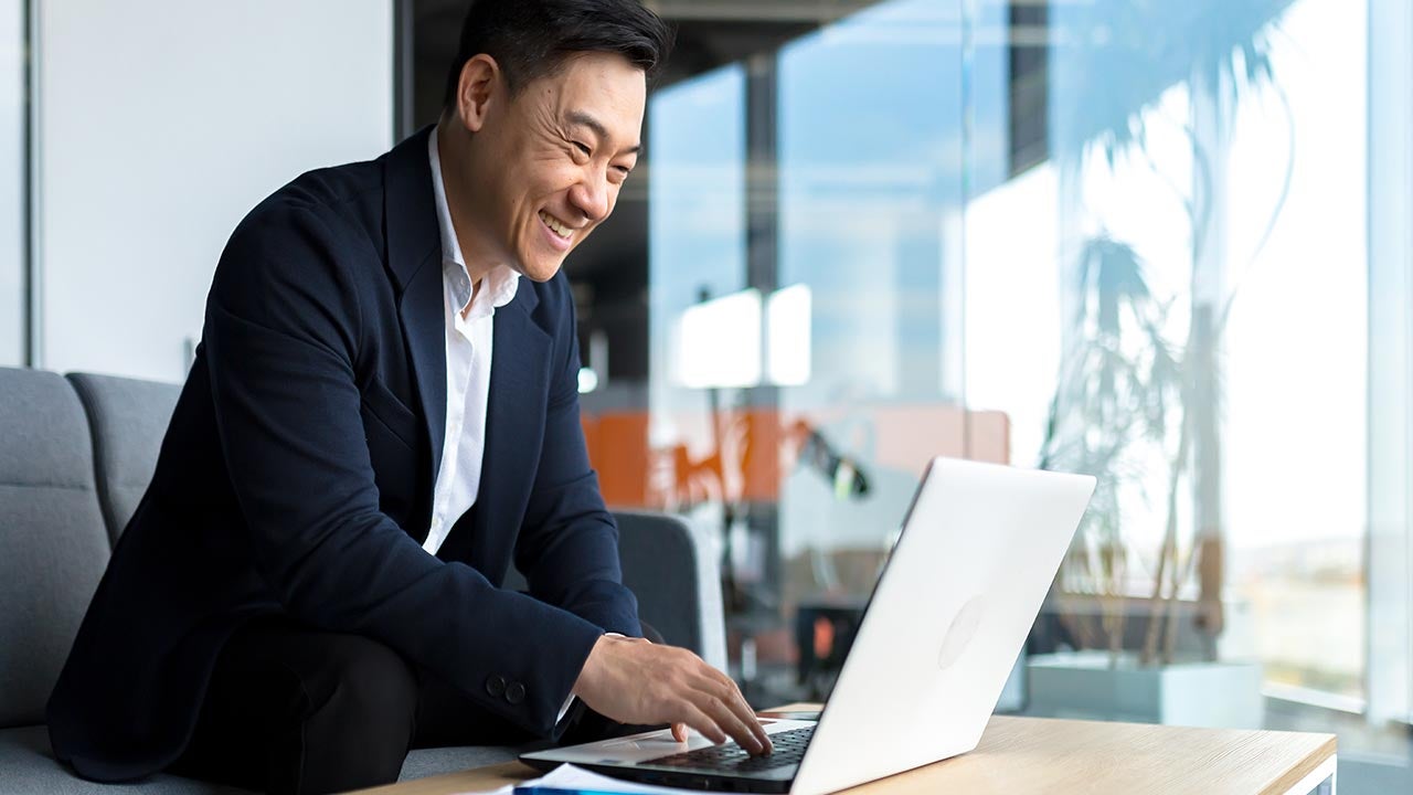 Businessman working on a laptop.