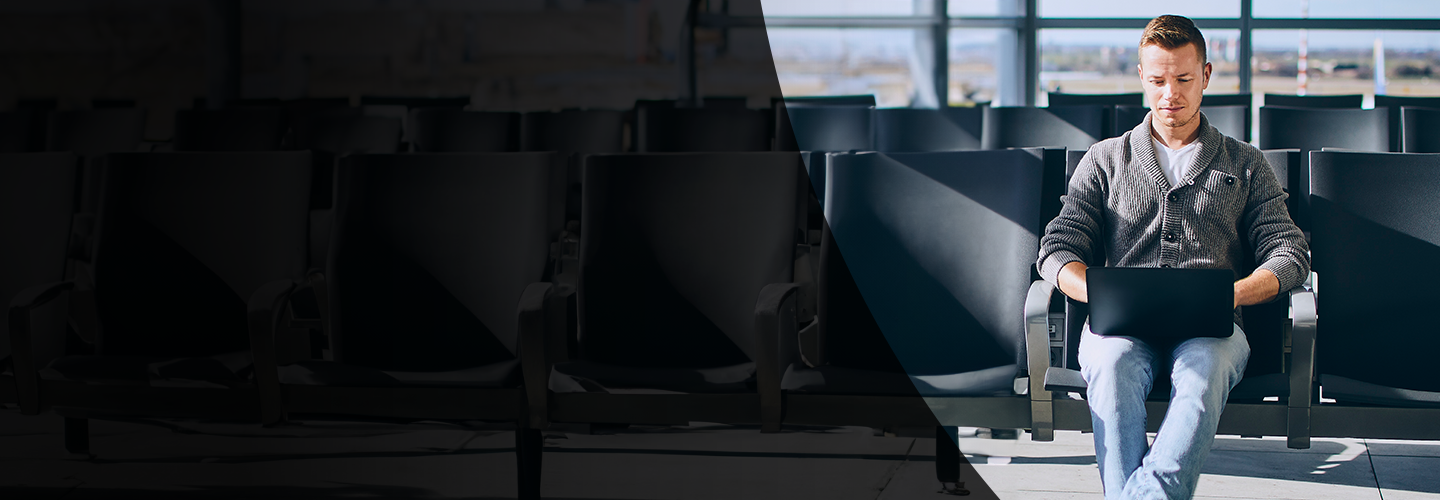 Man sitting at an airport