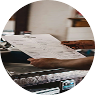 Man holding paper in hand