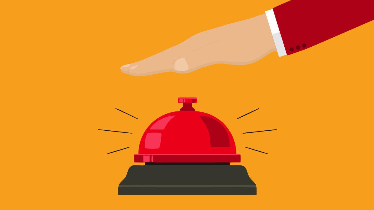 hand reaching to press service bell