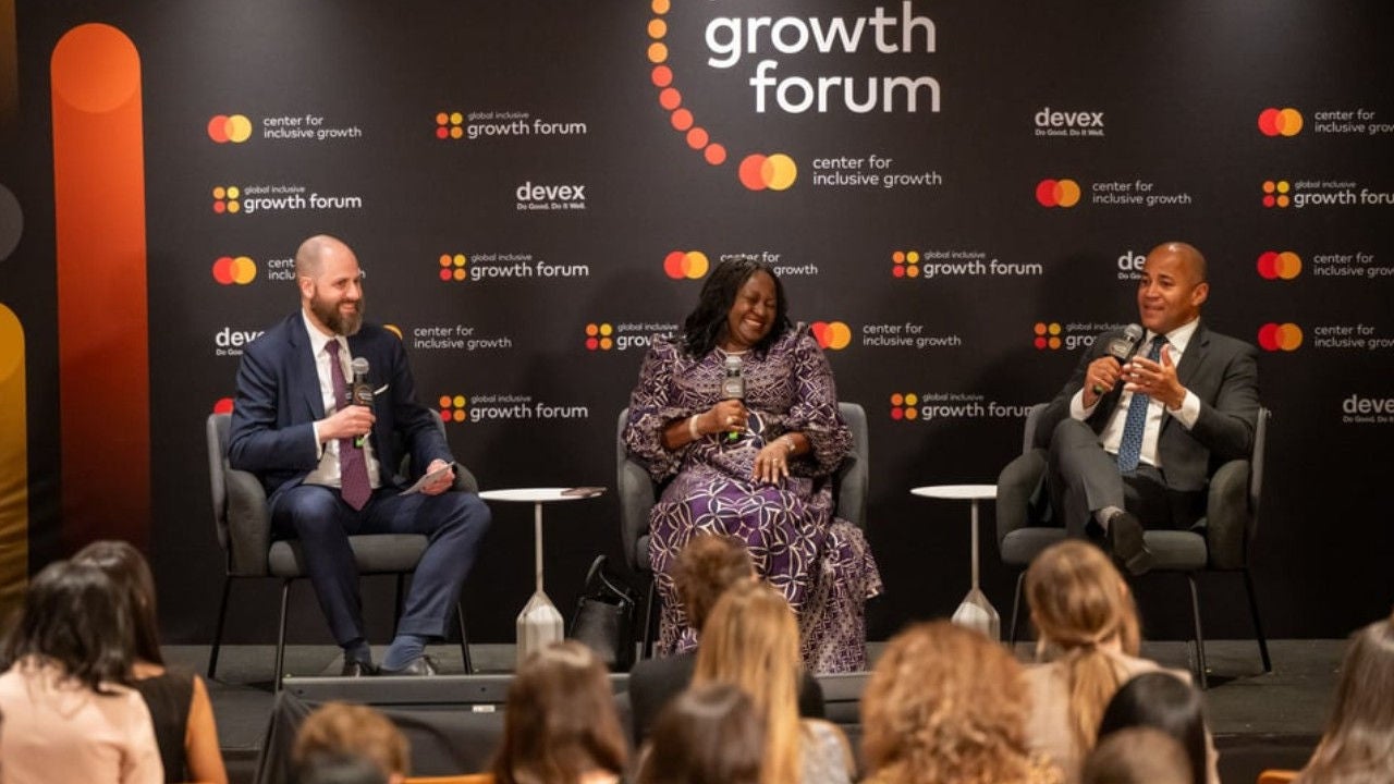 Jesse McWaters, Dante Disparte, Sabine Mensah at GIGF on stage. 
