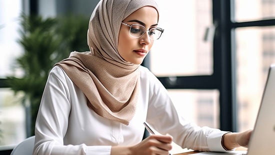 Woman working with laptiop