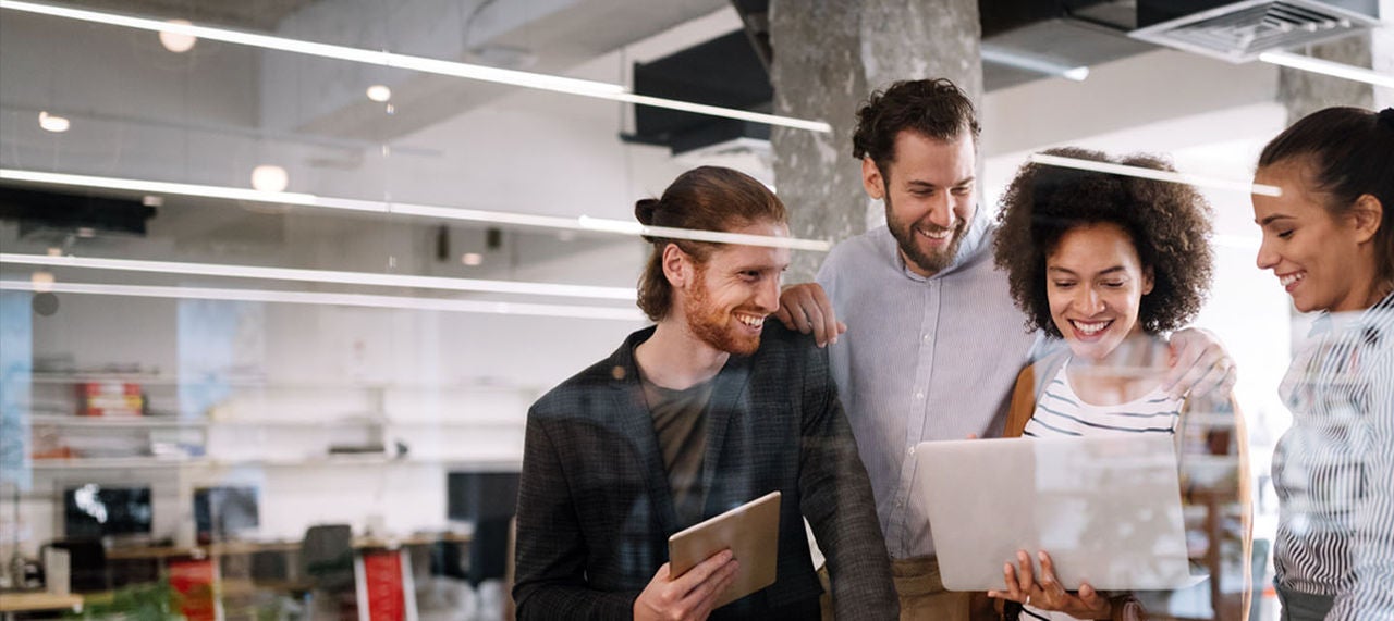 Group of young business people working on project