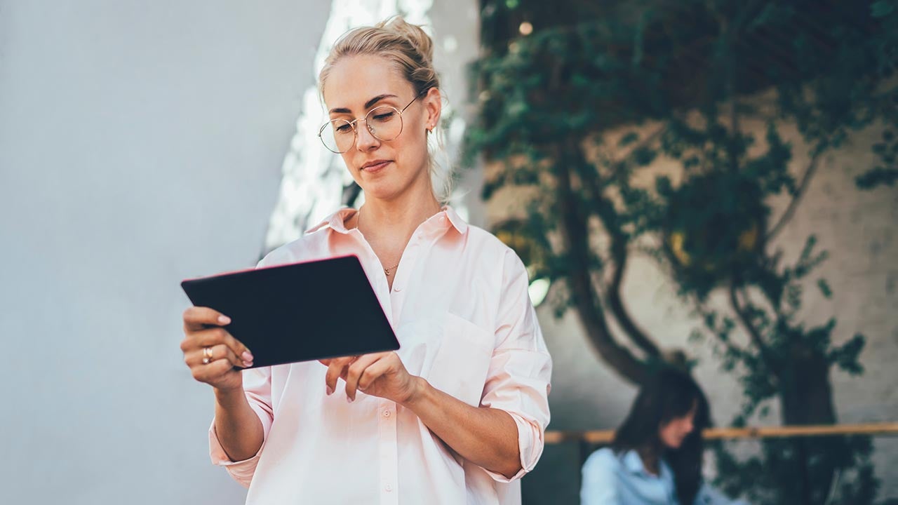 Woman on tablet browsing
