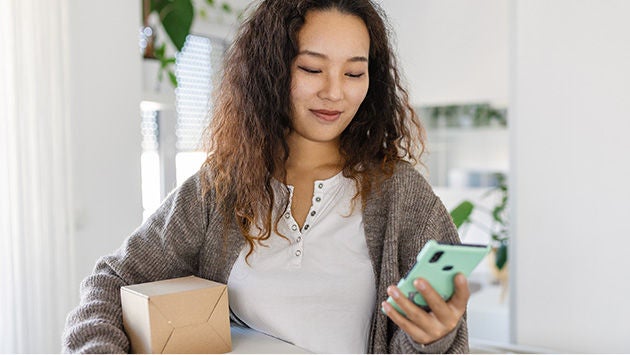 Woman looking at a smartphone