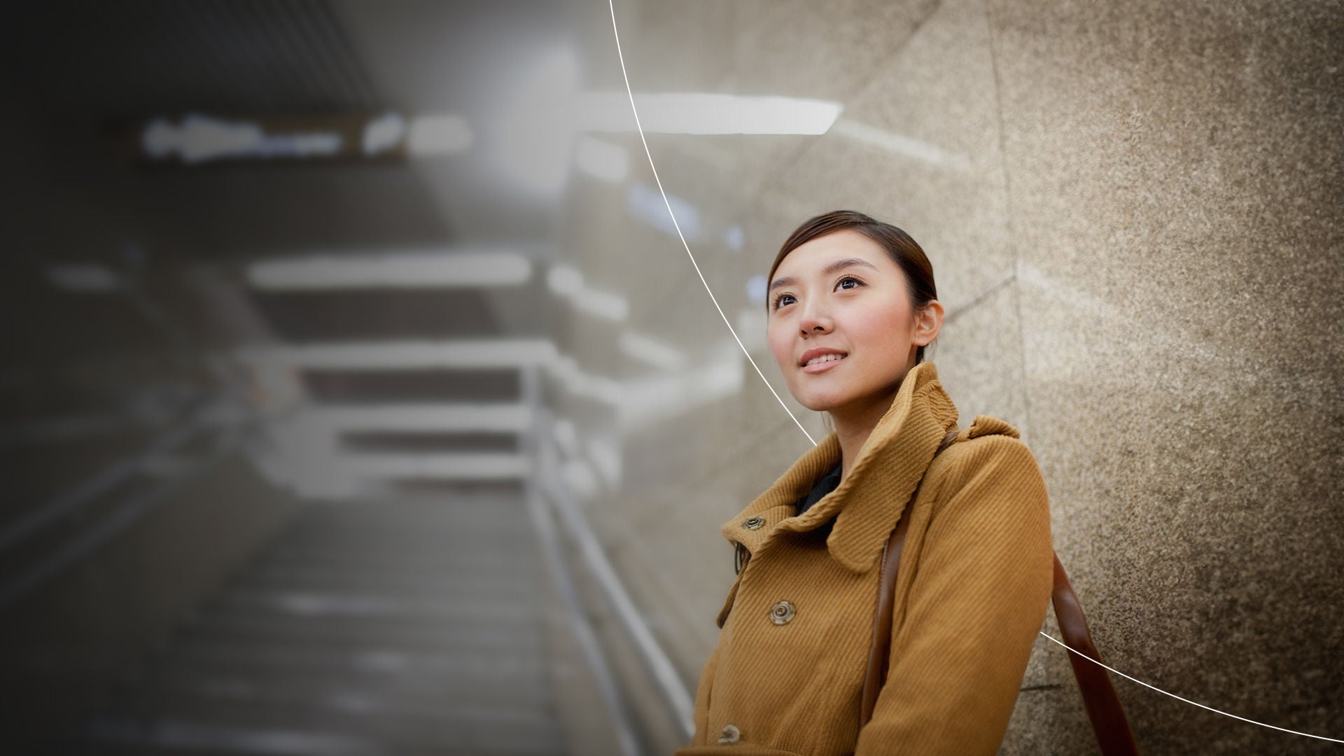 Young woman in subway station.