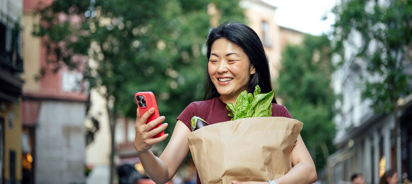 Woman picking up groceries from her online order