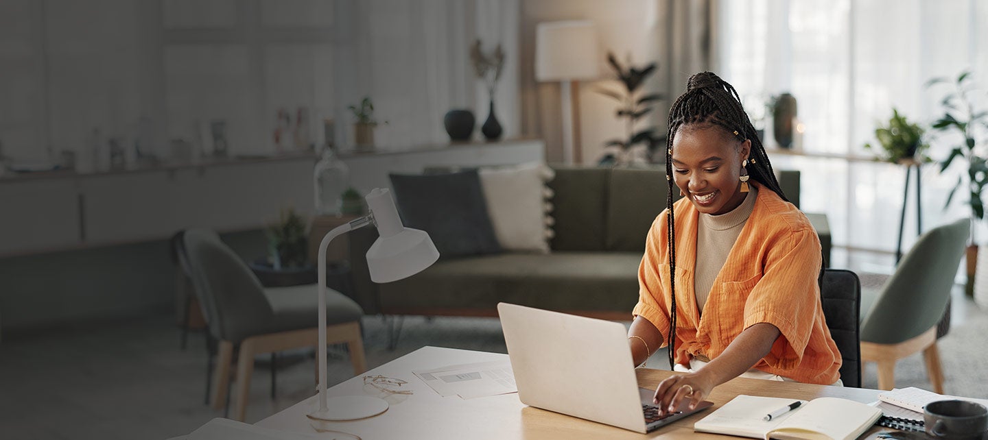 Woman working at home office.