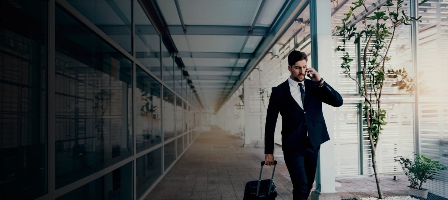 man walk with suitcase in airport