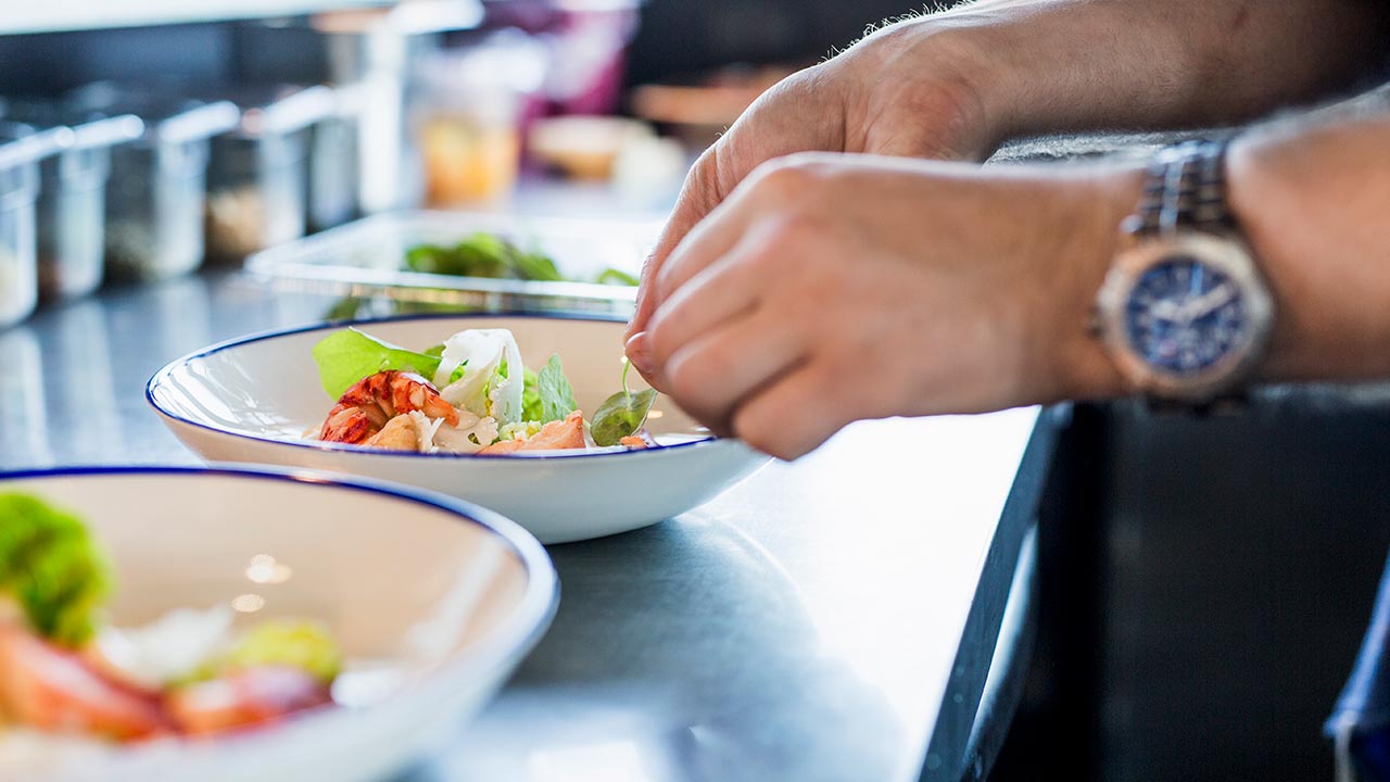 Business woman reading newspaper.